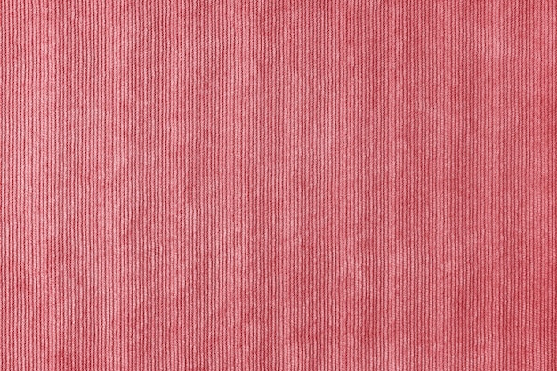 Red velveteen upholstery fabric texture background