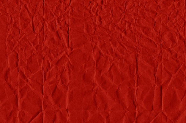 Red vintage and old looking crumpled paper background