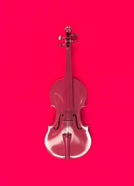 red violin on red background