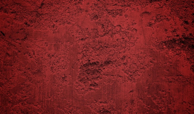 A red wall with a dark red background and the word love on it.