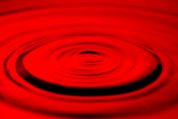 Red water rippled texture.