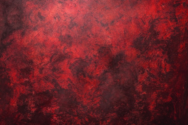 Red weathered wall textured background with garnet tones