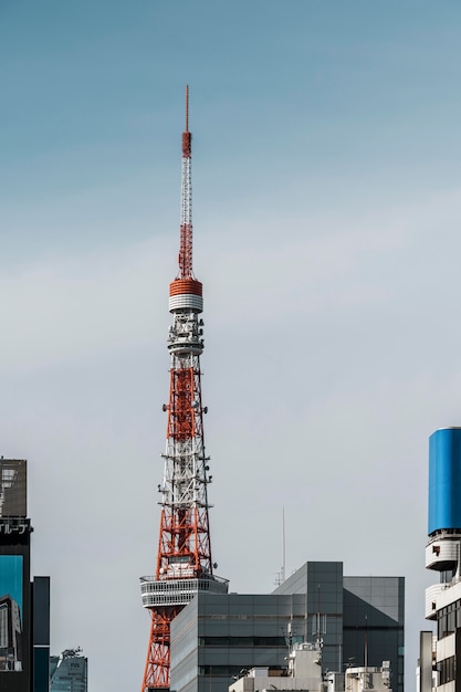 Red and white antenna in the city