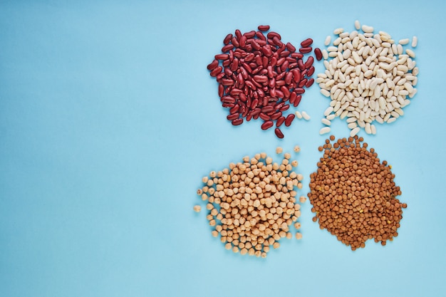 Red and white beans on a blue background