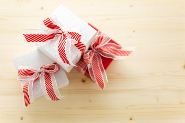 Red and white boxes with Christmas gifts.