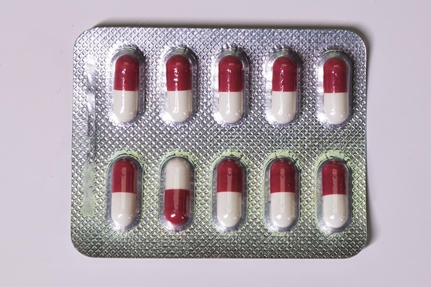 Red and White Capsules in a Blister Pack