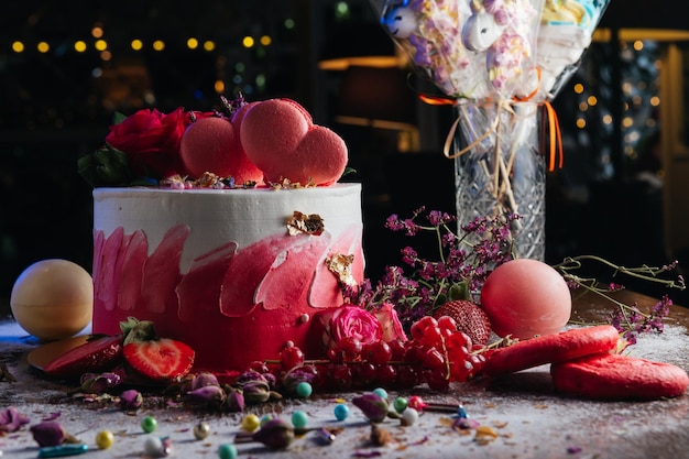 Red white cream cake with roses and hearts