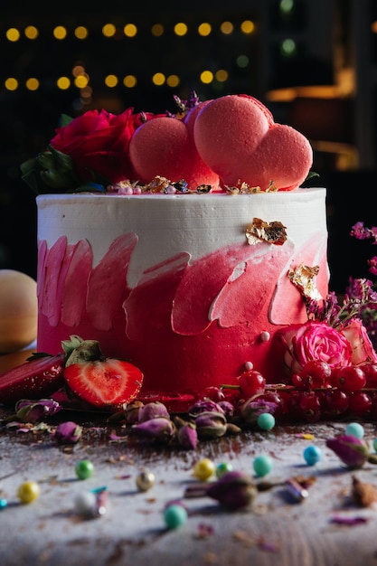 Red white cream cake with roses and hearts