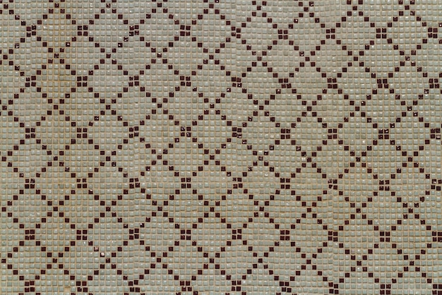 Красно-белая мозаичная фоновая плитка Крупным планом очистка геометрической мозаики уличной стены текстуры фона