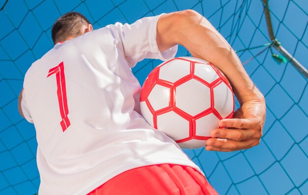 Foto giocatore di calcio rosso e bianco