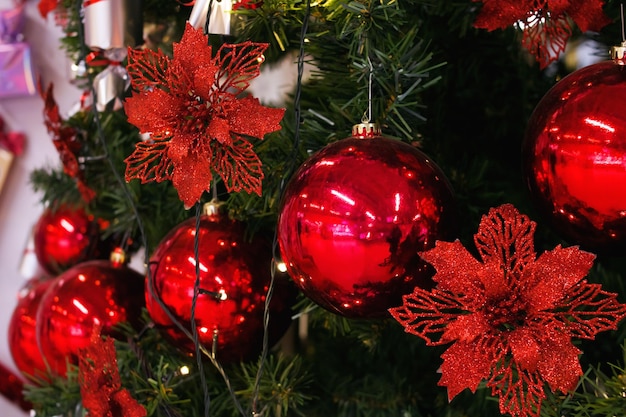 Red and white toys on Christmas tree