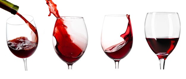 Red wine being poured in wineglasses, closeup