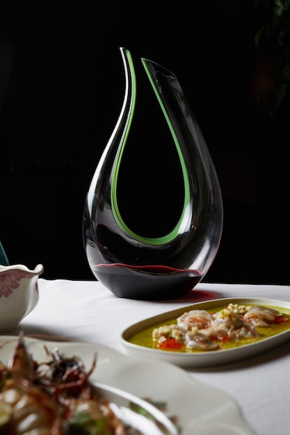 Red wine in a decanter on the table during dinner