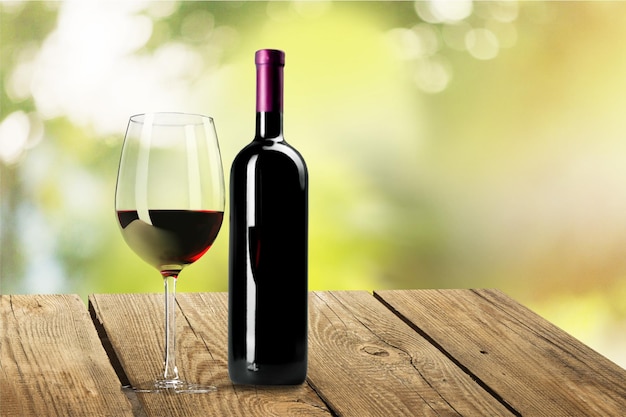 Red wine and glass  on  background