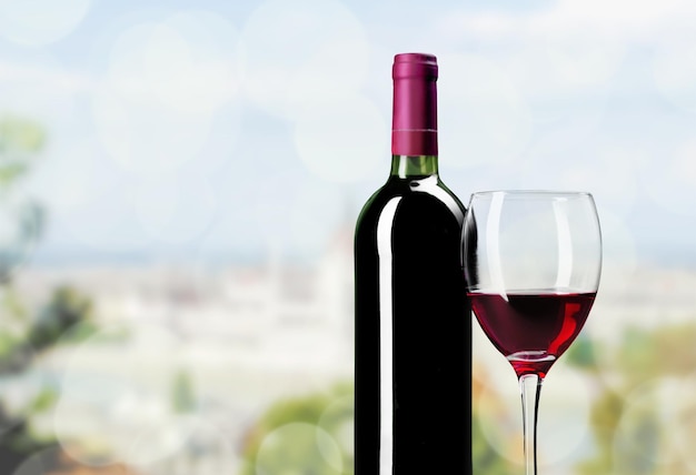 Red wine and glass  on  background