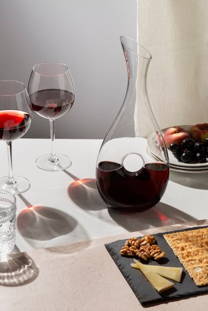 Photo red wine glass and carafe high angle