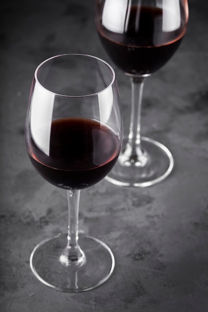 Red wine pouring in glass