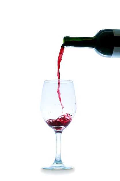 Photo red wine pouring into glass