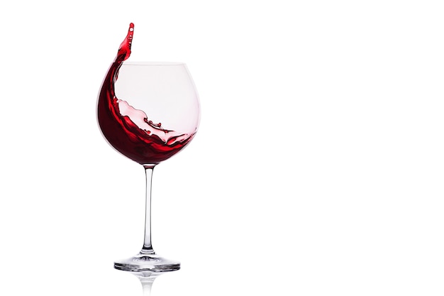 Red wine splash isolated on white background.