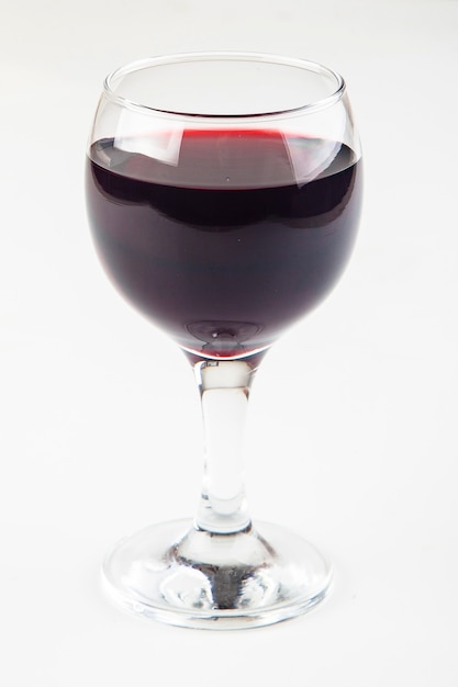 red wine in transparent glasses on a white background