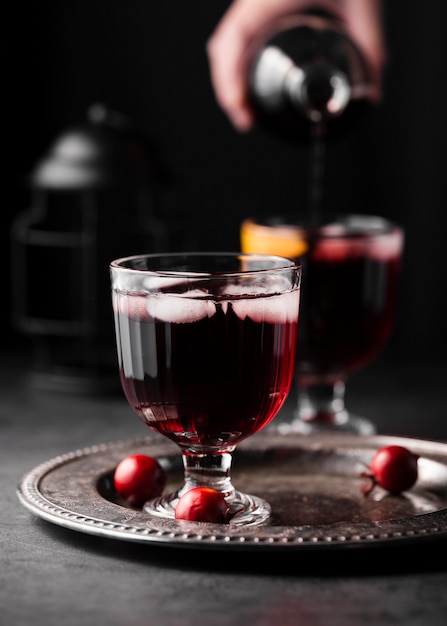 Red wine with ice close up