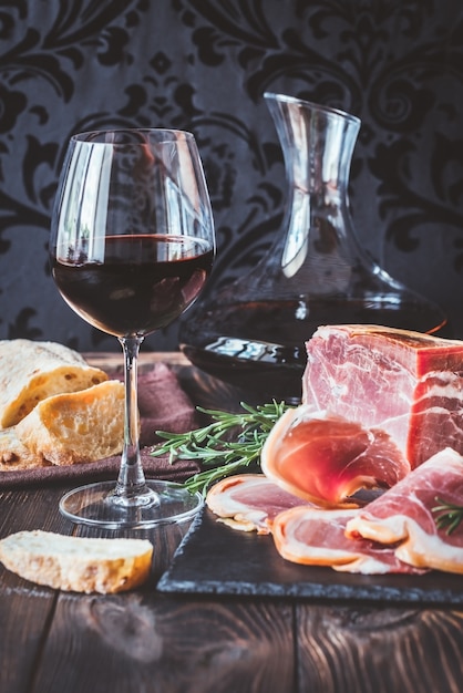 Red wine with prosciutto ham