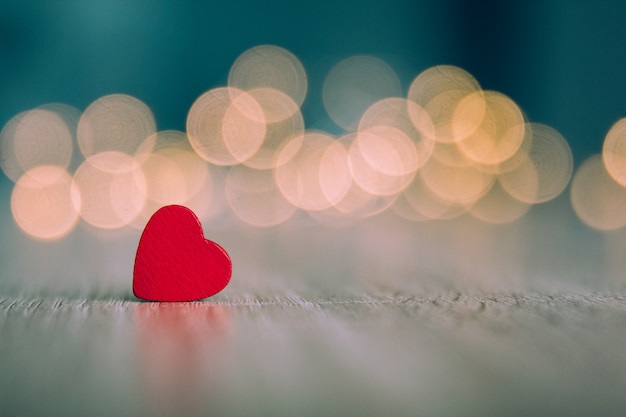 red wooden hearts with an unfocused background