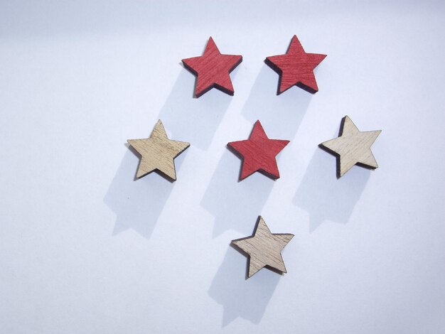 Photo red and yellow stars on a white background