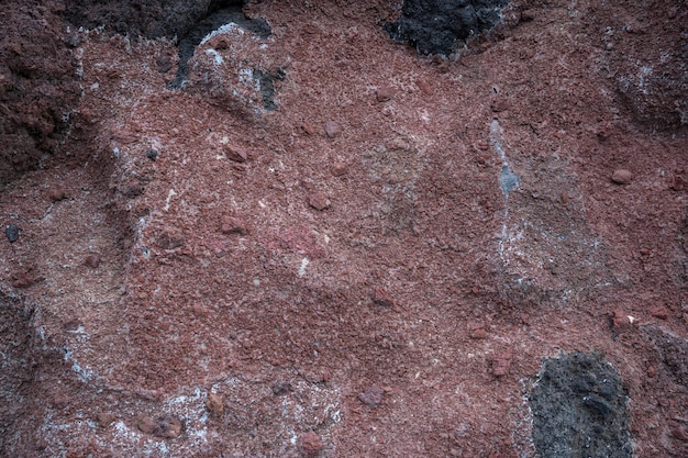 Reddish volcanic stone background