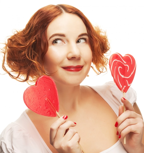 Photo redhair woman with big heart caramel