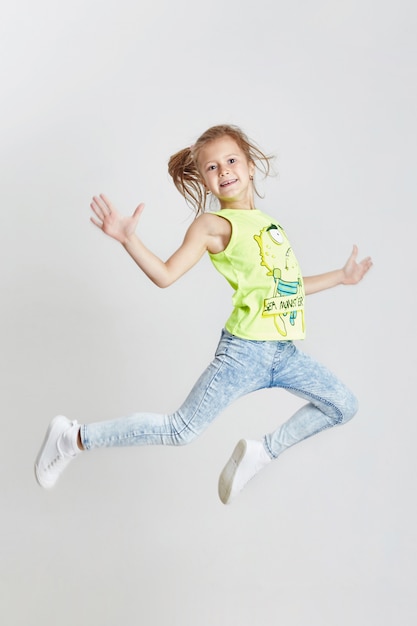 Redhead girl jumping, emotions