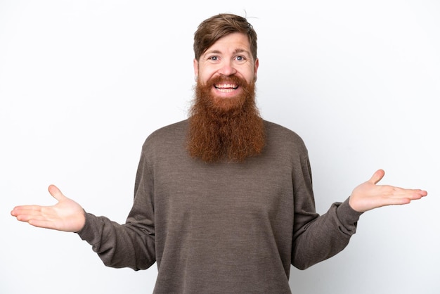 Redhead man with beard isolated on white background having doubts