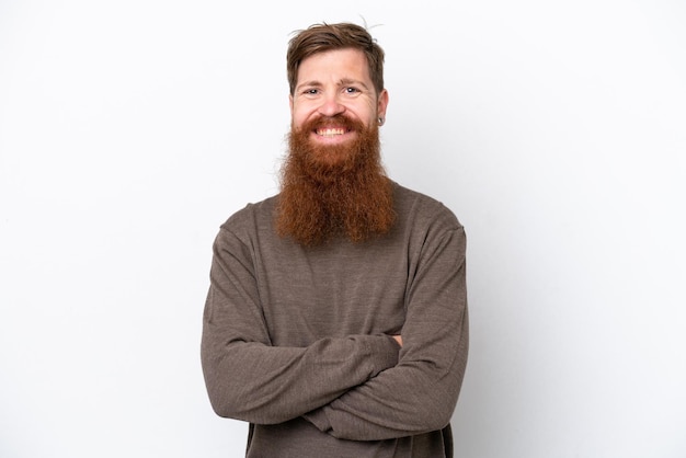 Redhead man with beard isolated on white background keeping the arms crossed in frontal position