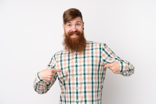 Redhead man with long beard over isolated white proud and self-satisfied