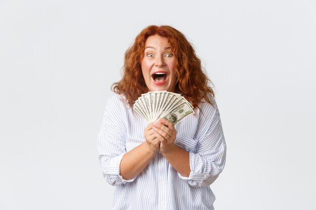 Redhead middle-aged woman posing