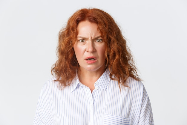 Photo redhead middle-aged woman posing