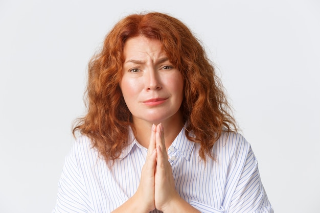 Redhead middle-aged woman posing