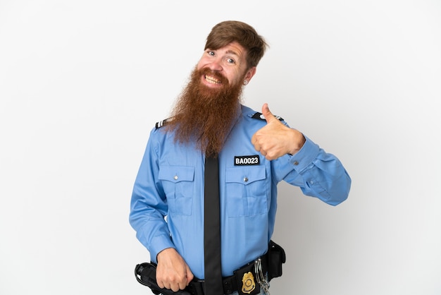 Redhead police man isolated on white background giving a thumbs up gesture