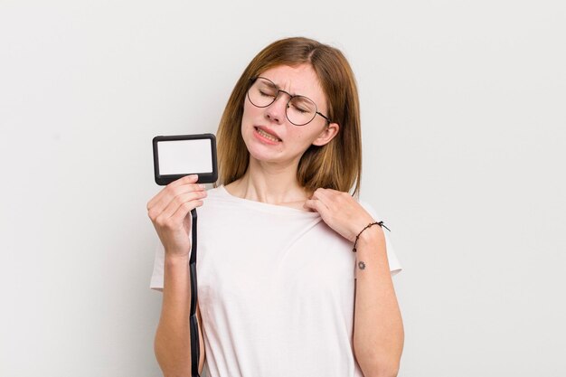 Redhead pretty girl feeling stressed anxious tired and frustrated vip pass id concept