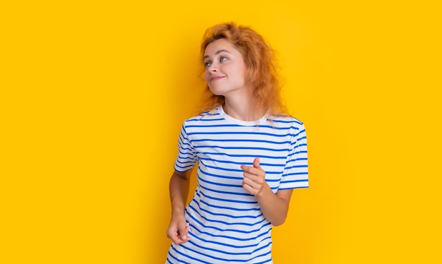 Redhead woman have fun isolated on yellow background portrait of young redhead woman in studio adult redhead woman portrait