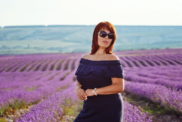 Redhead woman in lavender field