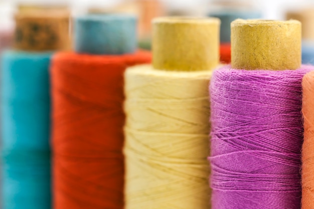 Reels or spools of multicolored sewing threads