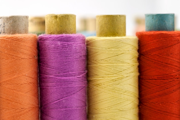 Reels or spools of multicolored sewing threads