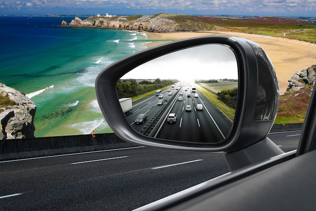 Reflected road in rearview mirror