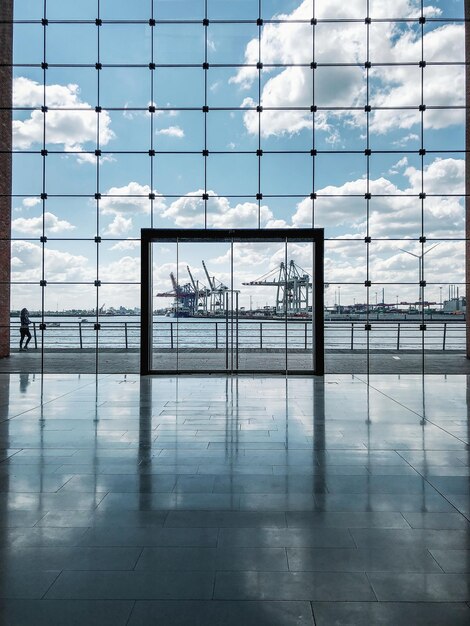 Reflection of building on glass window