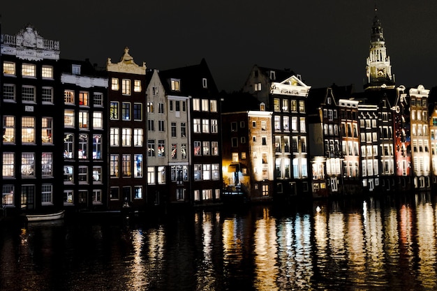 Reflection of buildings in city at night