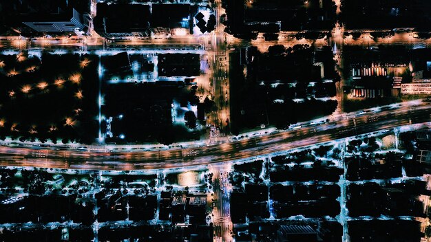 Photo reflection of illuminated building in water at night