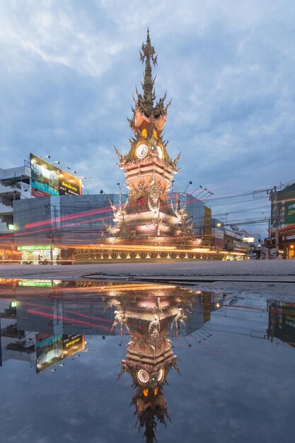 Reflection of illuminated building in water