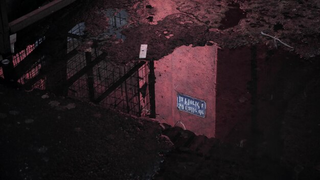 Photo reflection of an information sign in the water