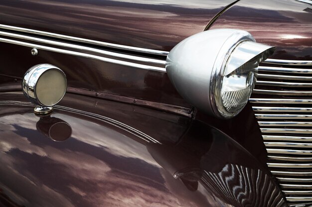 Reflection of the sky in the old car